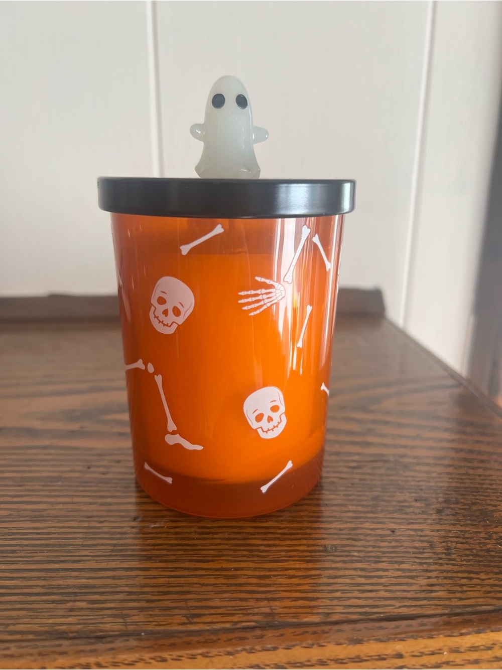 DW Home Halloween pumpkin scented glass candle with Ghost Lid White Skeletons